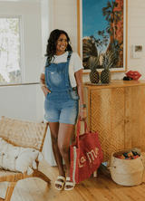 the classic shortie - the mumsie baby wearing overalls maternity baby carrier pregnancy