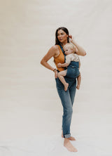 the lovechild - the mumsie baby wearing overalls maternity baby carrier pregnancy