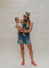 the classic shortie - the mumsie baby wearing overalls maternity baby carrier pregnancy