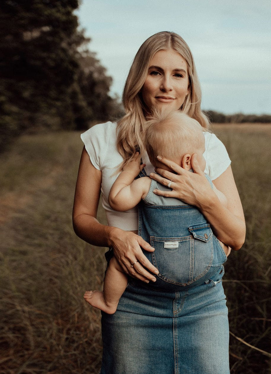 the summer - the mumsie baby wearing overalls maternity baby carrier pregnancy